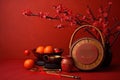 Accessories Chinese new year festival decorations.orange,leaf,wood basket,red packet,plum blossom,teapot on red background. Top Royalty Free Stock Photo