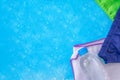 Accessories for swimming pool on a blue background Royalty Free Stock Photo