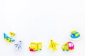 Accessories for treveling with children, toys on white background top view mock-up