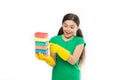 Accessory for cleaning. Housekeeping duties. Wash dishes. Cleaning with sponge. Cleaning supplies. Girl in rubber gloves