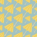 Accessory seamless pattern with yellow umbrellas. Blue background. Season rainy print