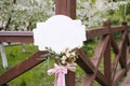 Accessory, white nameboard with nice boutonniere and bow