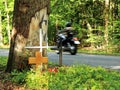 Accident crosses at the side of an country road in the wood