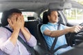 Car driving school instructor and male driver Royalty Free Stock Photo