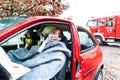 Accident - Fire brigade rescues Victim of a car Royalty Free Stock Photo