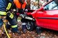 Accident - Fire brigade rescues Victim of a car Royalty Free Stock Photo