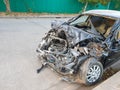 Accident front of black car crash get damaged by accident on the road.Damaged vehicle closeup after car crash Royalty Free Stock Photo