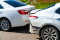Accident involving two white cars on a city street. Royalty Free Stock Photo