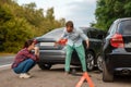 Accident, male and female drivers are sorted out Royalty Free Stock Photo