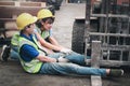 Accident at workplace, industrial engineer worker wearing helmet hit by forklift car at manufacturing plant factory construction Royalty Free Stock Photo