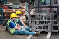 Accident at workplace, industrial engineer worker wearing helmet hit by forklift car at manufacturing plant factory construction Royalty Free Stock Photo