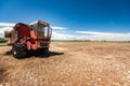 Accidental and burned tractor for grain processing Royalty Free Stock Photo
