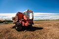 Accidental and burned tractor for grain processing Royalty Free Stock Photo