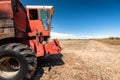 Accidental and burned tractor for grain processing Royalty Free Stock Photo
