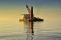 Accommodation work barge anchorage at sea with beautiful sunset