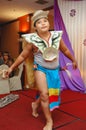 A young Kayan kid performing warrior dance called ngajat. Royalty Free Stock Photo