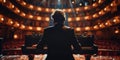 An accomplished pianist sits poised at a grand piano, ready to enchant the audience with his musical talents on stage Royalty Free Stock Photo