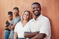 Accomplishing goals together. Cropped portrait of a handsome young businessman standing with his colleagues against a Royalty Free Stock Photo