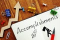 Accomplishments are shown on the business photo using the text Royalty Free Stock Photo