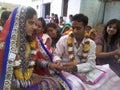 According to Hindu customs, the fiance bride wore the ring to the fiance during the engagement ceremony.