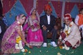 According to old customs, the bride and groom take the blessings of their elderly parents during the reception. Royalty Free Stock Photo