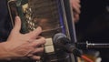 Accordion player - close up view of fingers on musical instrument Royalty Free Stock Photo