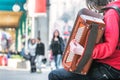 Accordion player on the street Royalty Free Stock Photo