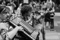 Accordionist Performing with The Hyde Family Jam Band on a street in York.