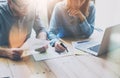 Account team discussion. Photo young business crew working with new startup project.Notebook on wood table. Idea Royalty Free Stock Photo