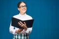 Accountant business woman wearing glasses portrait with book Royalty Free Stock Photo