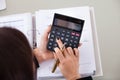 Accountant calculating tax at desk Royalty Free Stock Photo