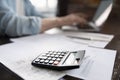 Accountant calculator and financial documents on work table Royalty Free Stock Photo