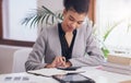 Accountant, calculator and woman with pen on desk for finance budget, math or planning. Professional african person with Royalty Free Stock Photo