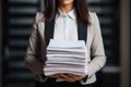 An accountant carries a stack of documents in his hands. A female secretary holds a stack of papers in her hands. Concept: Office Royalty Free Stock Photo