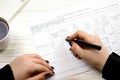 Accountant fill french tax form 2041E Withholding tax declaration in end of tax period. Taxation and paperwork routine