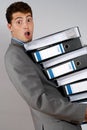 Accountant with pile of docume