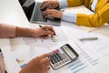 accountant  pointing on laptop for meeting team in office room. concept finance and accounting Royalty Free Stock Photo