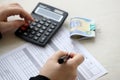 Accountant start to fill Iranian tax form on office table. Taxation period and annual taxpayers routine