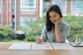accountant woman checking paperwork from accounting department to analyse number on document information comparing Royalty Free Stock Photo