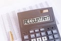 ACCOUNTANT word inscription on calculator display on office table