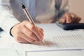 accountant working on desk to using calculator with penaccounta Royalty Free Stock Photo