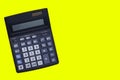 Accounting calculator on a yellow background with a copy space Royalty Free Stock Photo