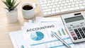 Accounting data chart with calculator and computer on office desk Royalty Free Stock Photo