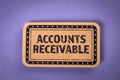 ACCOUNTS RECEIVABLE. Cardboard sticker with text on purple background