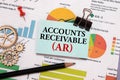 Accounts receivable-the inscription of text on the Notepad. Calculator for calculations