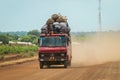Crowded African Public Bus on the Dusty Road in the heart of Ghana Royalty Free Stock Photo