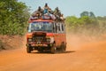 Crowded African Public Bus on the Dusty Road in the heart of Ghana
