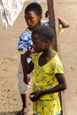 Unidentified Ghanaian girl touches her face with her fingers. Royalty Free Stock Photo