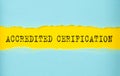 ACCREDITED CERTIFICATION text on the torn paper , yellow background