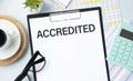 Accredited write on a paperwork isolated on office